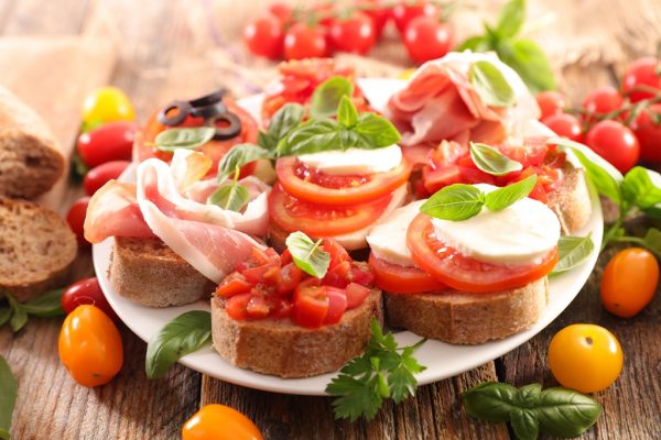 canape with tomato, mozzarella and basil